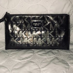 MK silver/gray metallic wristlet clutch bag